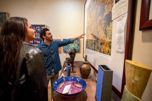 Couples exploring museums