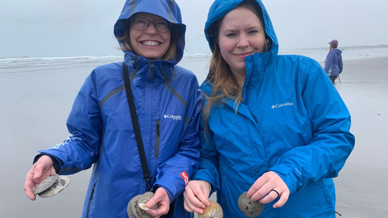 Ladies with shells at beach