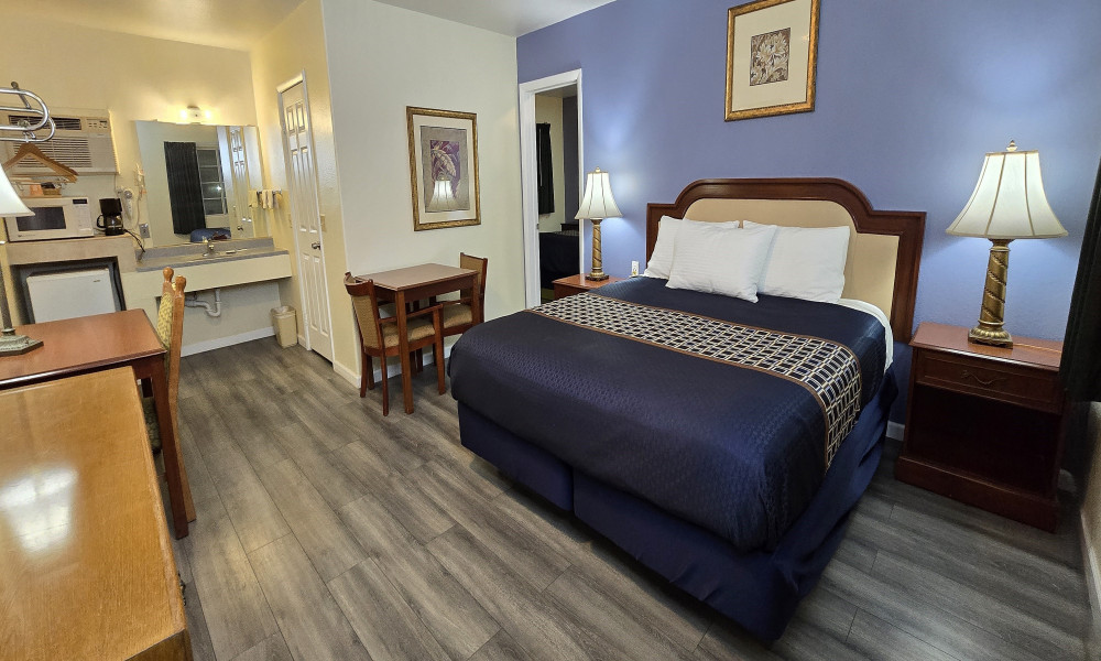 1 King Bed, 2 Queen Beds, 2 Bedrooms, Pool View
