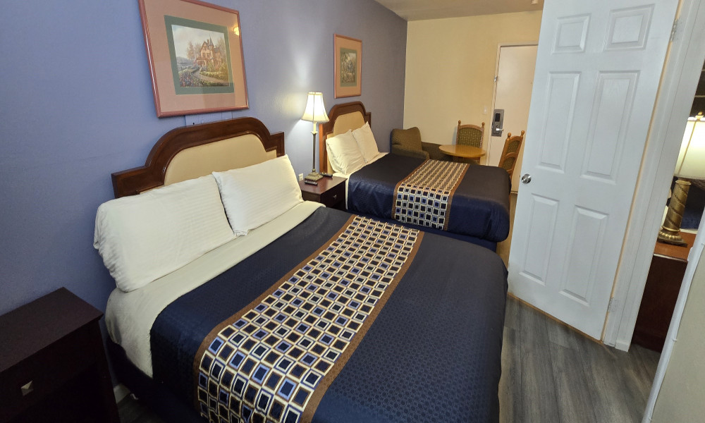 1 King Bed, 2 Queen Beds, 2 Bedrooms, Pool View